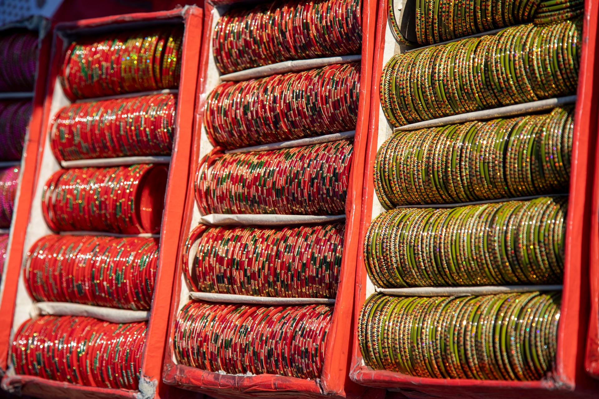 Colorful Rows of Traditional Bangles on Display at Indian Village Mela Market
